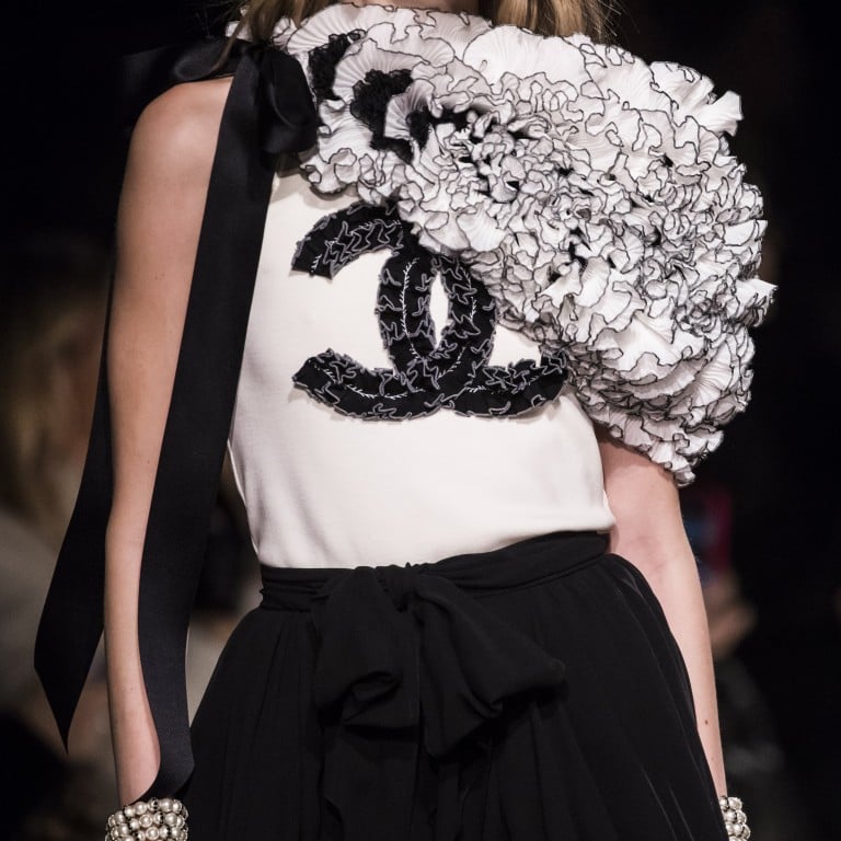 Chanel recreated the iconic curved mirrored staircase that lead to Coco Chanel’s private flat on Rue Cambon beneath the nave of the Grand Palais. Photo: Christophe Petit Tesson/EPA-EFE