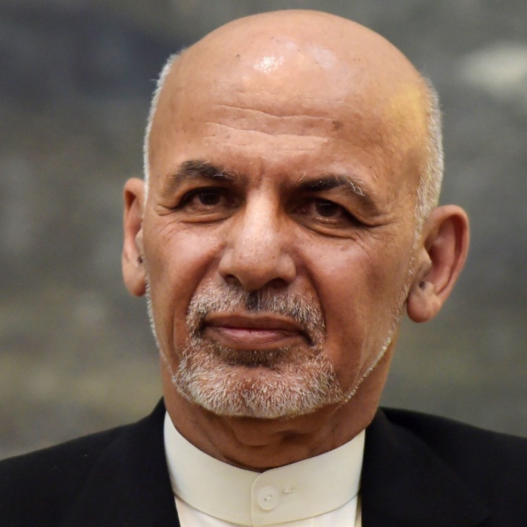 Afghanistan's President Ashraf Ghani wins slim majority in ...