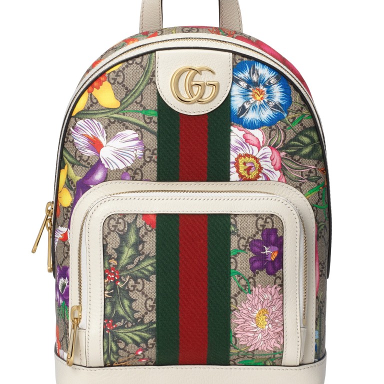 Gucci’s seasonal Gift Giving collection includes handbags, scarves, slippers, sneakers and more, and comes wrapped in holographic, striped tie-dye packaging. Photos: Gucci