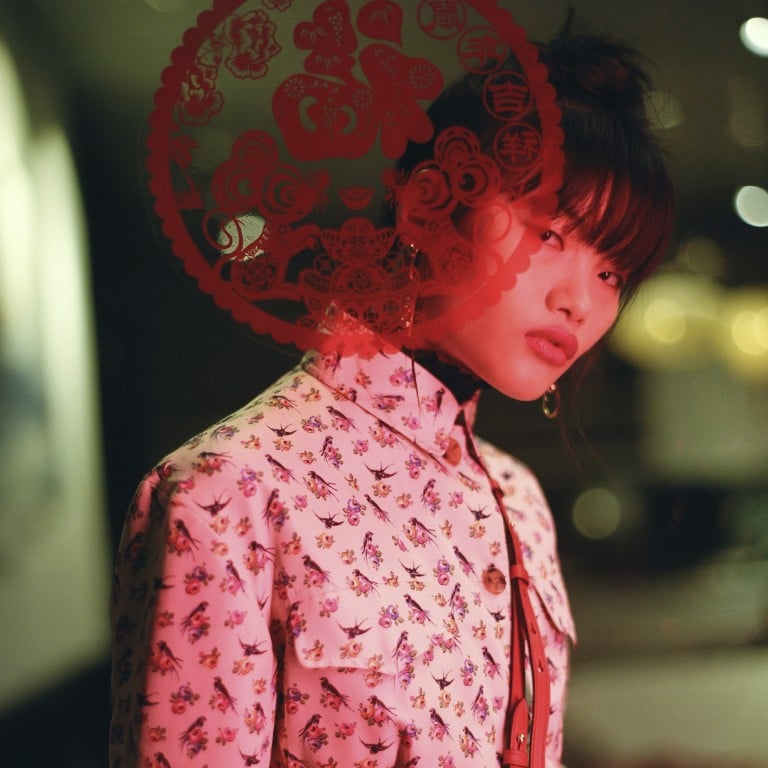 Young millennials are embracing inventive ways to channel the traditional red of Lunar New Year with modern fashion styles. Photo: Prada