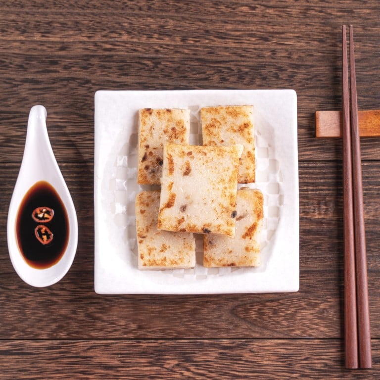 Turnip cake, a Chinese traditional local radish cake, is believed to bring luck during Lunar New Year. Photo: Getty Images