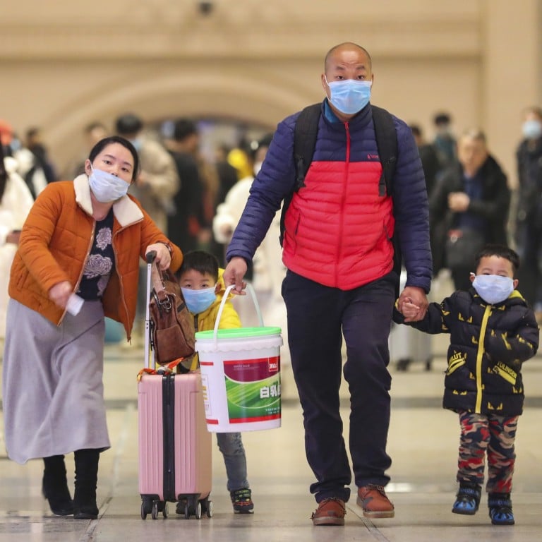 China coronavirus: as travel ban is issued for Wuhan, many in city ...