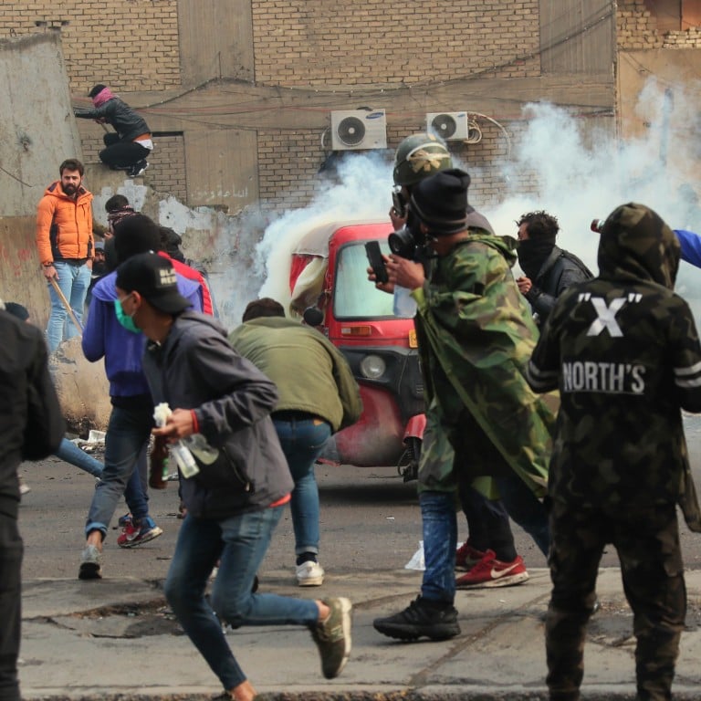 Image result for IRAQ PROTESTS SECURITY FORCES FIRE AT DEMONSTRATORS AT BAGHDAD'S MAIN CAMP