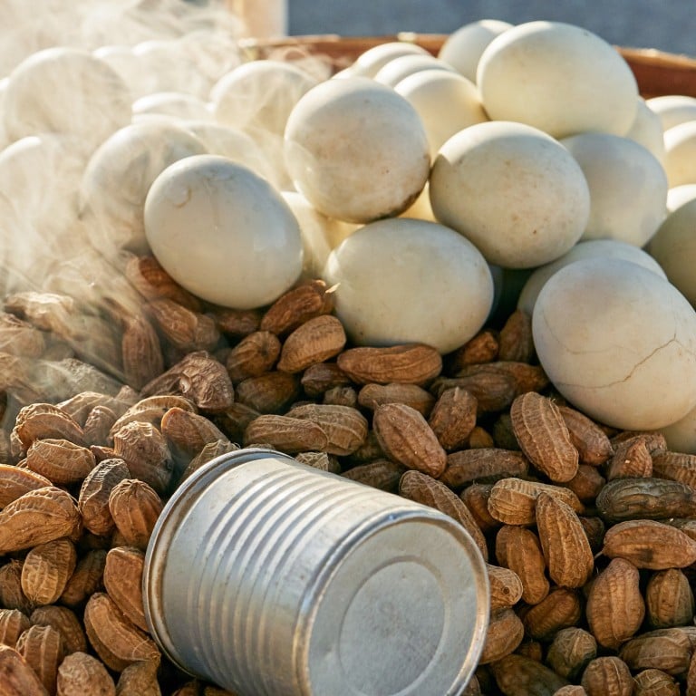 Steamed peanuts and white boiled eggs are available on a native bamboo tray with a measuring cup, in the late afternoon in the Philippines. Photo: Getty Images/iStockphoto