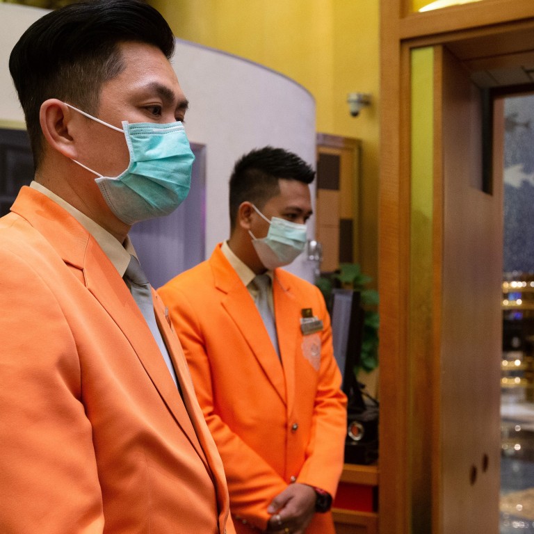 Coronavirus Macau Casinos Reopen For Masked Punters After Two
