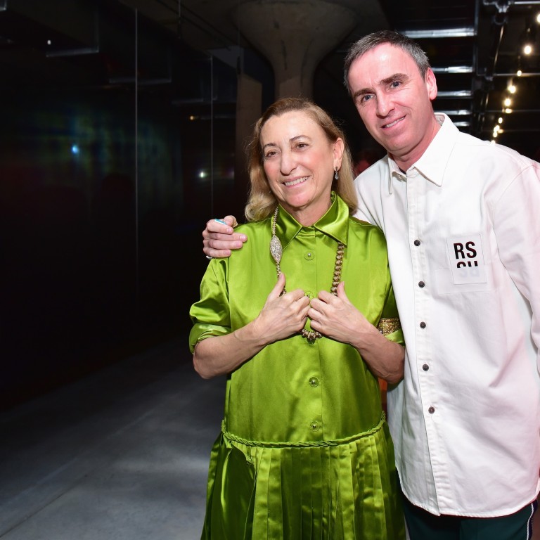 Designers Miuccia Prada (left) and Raf Simons attend the Prada Resort 2019 fashion show in New York in May 2018. The duo said they would collaborate on Prada collections from spring/summer 2021. Photo: Getty Images / AFP