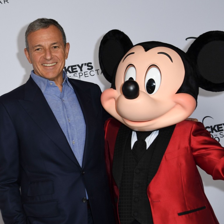Disney’s Bob Iger and Mickey Mouse at Mickey’s 90th Spectacular at The Shrine Auditorium in Los Angeles in October 2018. Photo: AFP