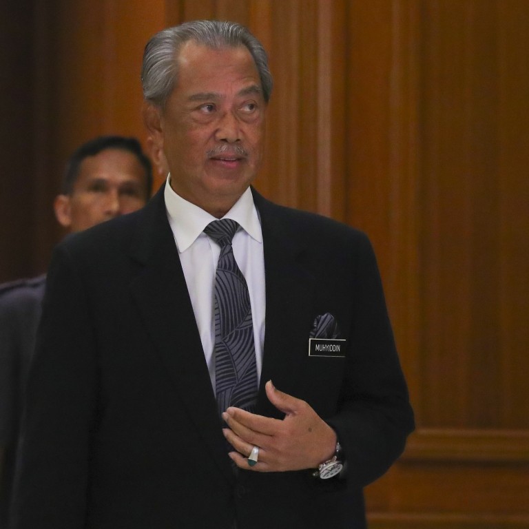Malaysia’s Prime Minister Muhyiddin Yassin arrives for a press conference in Putrajaya, Malaysia. Photo: EPA
