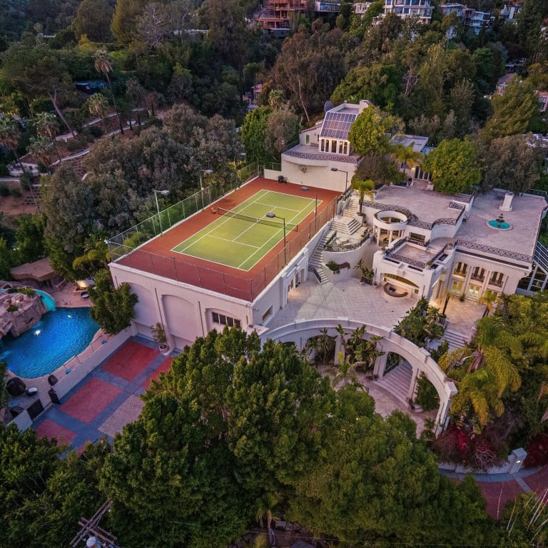 Behind this luxurious mansion lies a unique story between NBA-star Carlos Boozer and the late music icon Prince. Photo: The Oppenheim Group