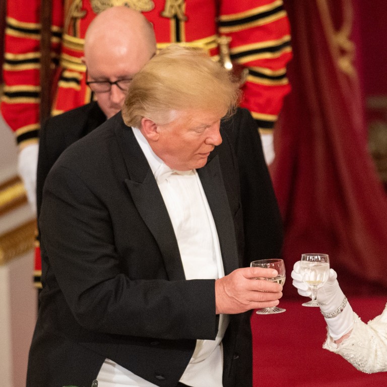 Self-proclaimed teetotaller US President Donald Trump and Queen Elizabeth make a toast at the state banquet at Buckingham Palace last June. Photo: Reuters
