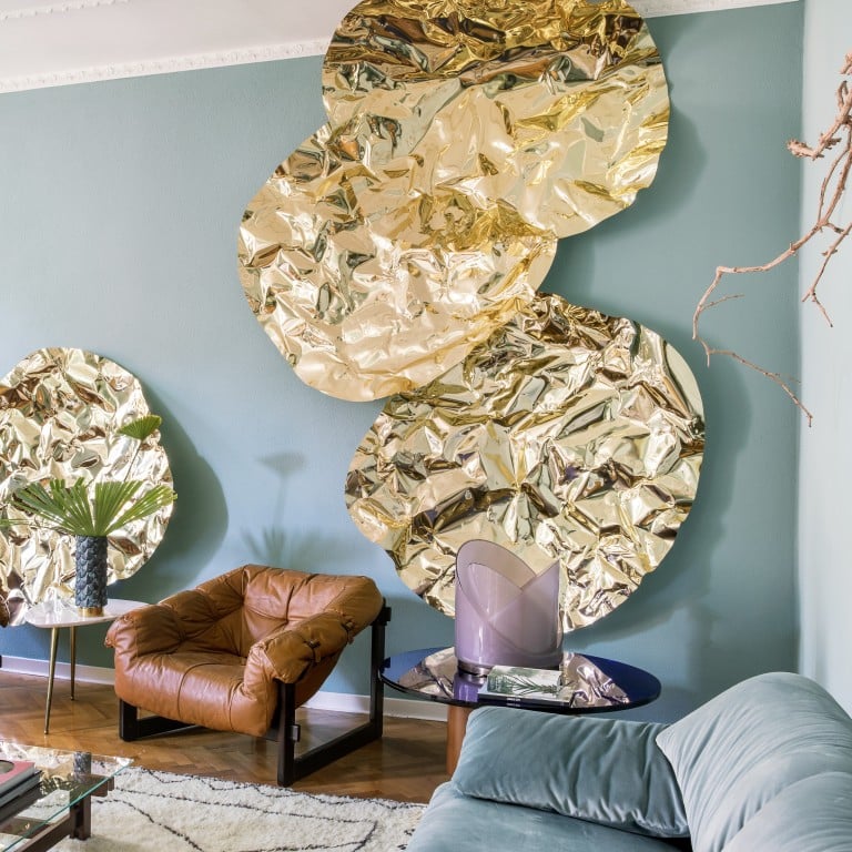 Golden artworks stand out in the living room of Vicenza native Giacomo Totti’s home. Photos: Helenio Barbetta/Living Inside