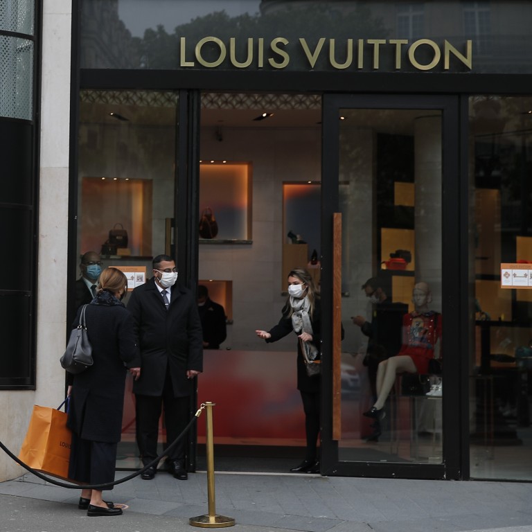 View of a closed Louis Vuitton store on the avenue Montaigne after  gourvernement measure due to the coronavirus (Covid-19) pandemic in Paris,  on April 8, 2020 in Paris, France. France recorded another