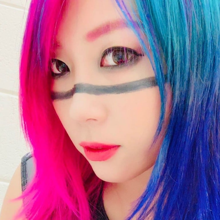 And in the pink and blue corner is WWE champ Asuka. Photo: @wwe_asuka/Instagram