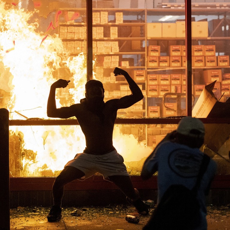 Shops looted, US outrage grows over racially charged police ...