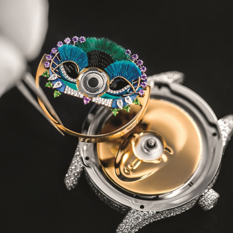 The oscillating weight is carefully laid on the Dior Grand Bal Masqué timepiece. Photo: Dior