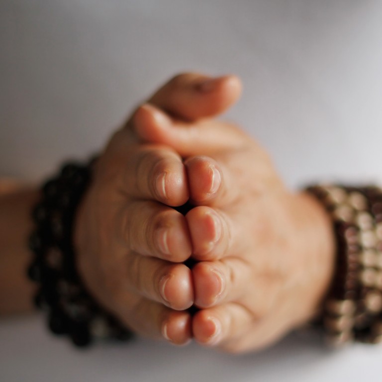 Would you give up billions for a life of spiritual servitude? Ananda Krishnan’s son did. Photo: Getty Images