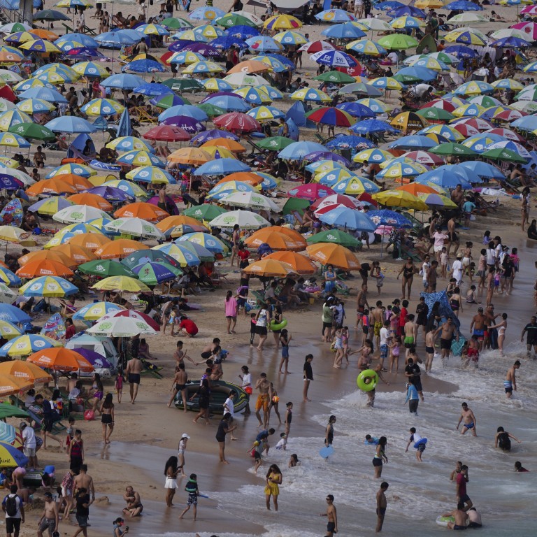 Shek O beach in May while relaxed social-distancing regulations were still in force. Psychiatrist Dr Hui Lung-kit says pandemic fatigue began affecting people from as early as March. Photo: Sam Tsang