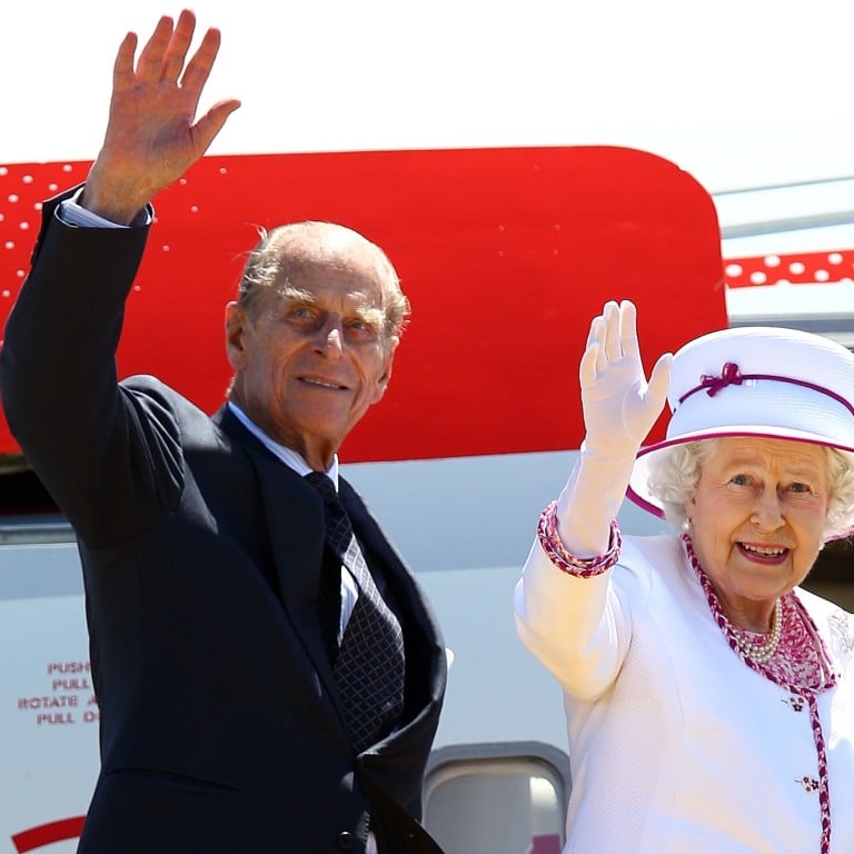 Queen Elizabeth and Prince Philip wave farewell to Australia at Perth International Airport in October 2011, one of her last major international trips. Photo: AFP
