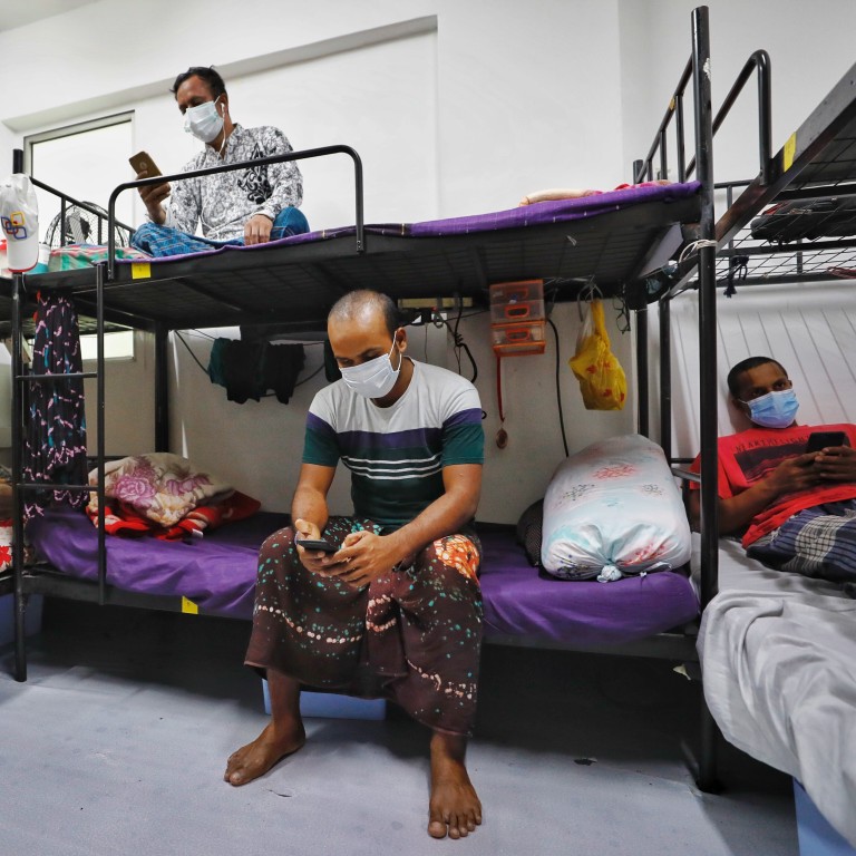 Tens of thousands of foreign workers in Singapore have been put under quarantine amid the pandemic, and returning to their home countries – including China – is simply not an option. Photo: EPA