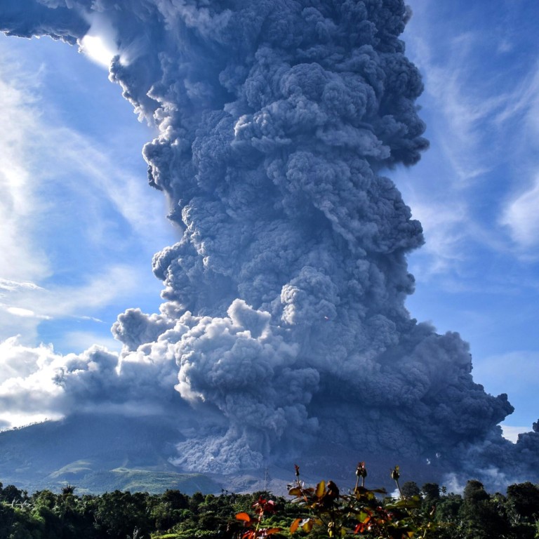 Indonesia's Sinabung volcano erupts, ejecting towering column of ...