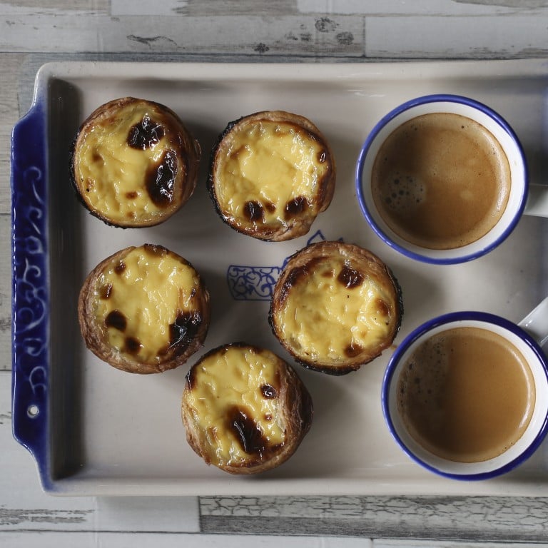 What do you think Hong Kong’s most famous dish is? Egg tarts and Hong Kong milk tea is a popular choice for local foodies and a former governor. Photo: SCMP