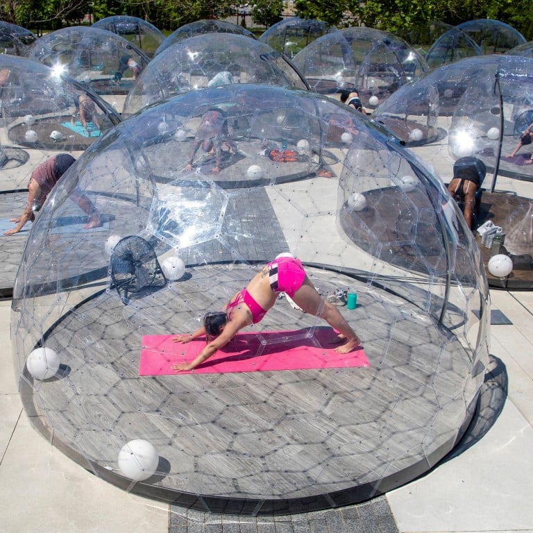 From underground or speakeasy gyms to yoga in a bubble, even dusting off running shoes and hitting the pavement, are all part of the new normal to stay fit. Photo: Reuters