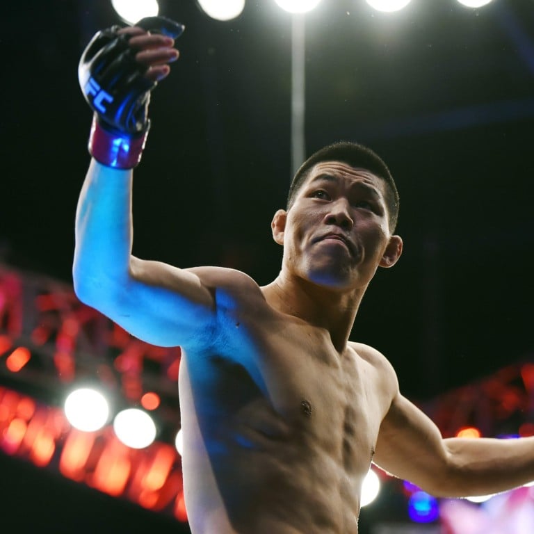 MMA fighter Li Jingliang almost didn’t take up wrestling but it’s made him a cool US$25 million. Photo: AFP PHOTO/OSPORTS/ STR/China OUT/XGTY