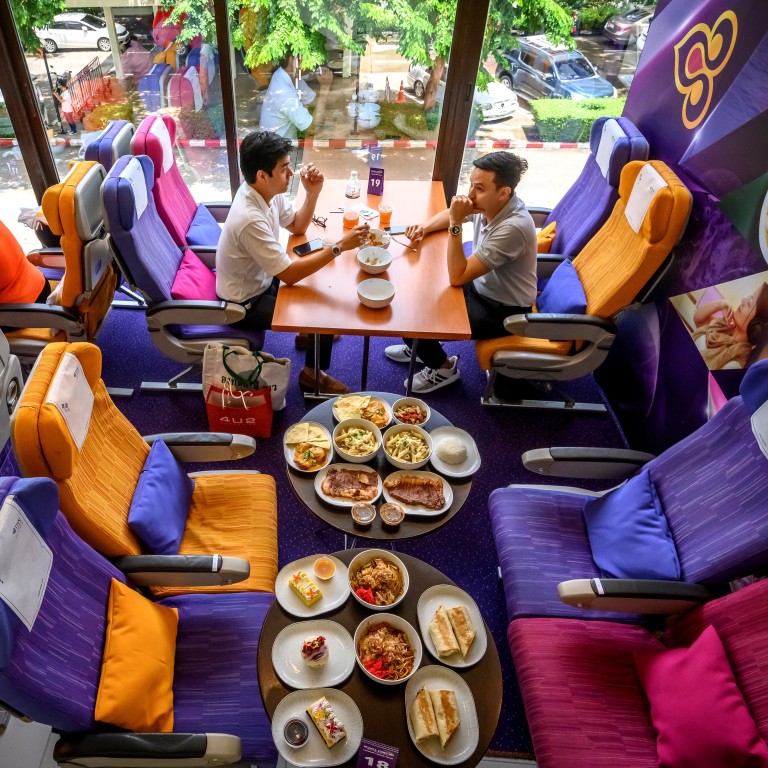 In Thailand A Cafe Made To Look Like An Aircraft Cabin And An Actual Airliner Turned Coffee Shop Remind People Of The Flights They Cannot Take South China Morning Post