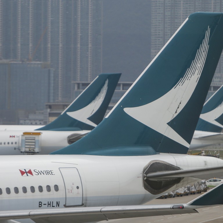 Cathay Pacific planes sit grounded at Hong Kong International Airport. Photo: Winson Wong