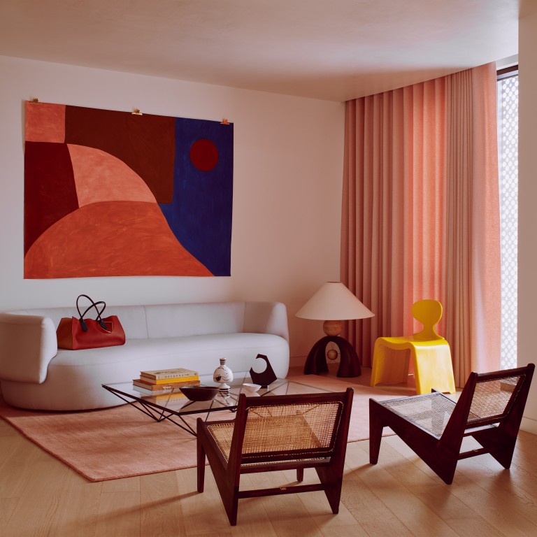 The Gasholders Penthouse’s living room is uncluttered, allowing the furniture and artworks – including the mural by Caroline Denervaud – to claim the attention they deserve. Photo: Michael Sinclair