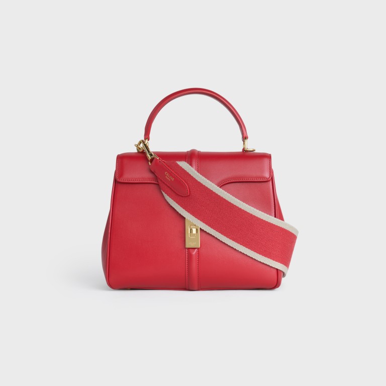 Add the new strap and the demure Celine 16 in red takes on a more freewheeling character. Photo: Celine