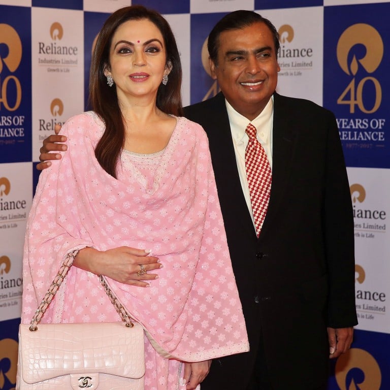 Nita Ambani poses with husband Mukesh Ambani, chairman and managing director of Reliance Industries, in July 2017. Photo: Reuters