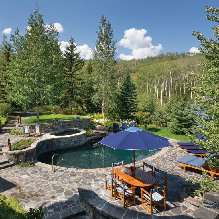 Nestled among the aspens, 183 East Fork Lane in Snowmass Village, Colorado, has an outdoor pool and multiple patios. Photo: Knight Frank & Douglas Elliman