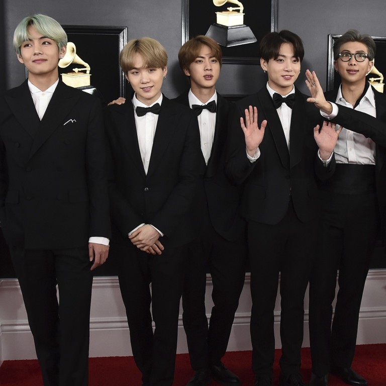 Can BTS members beat out Taylor Swift and Lady Gaga to win a Grammy?  They're breaking barriers as the first K-pop group to be nominated with  Dynamite, say experts