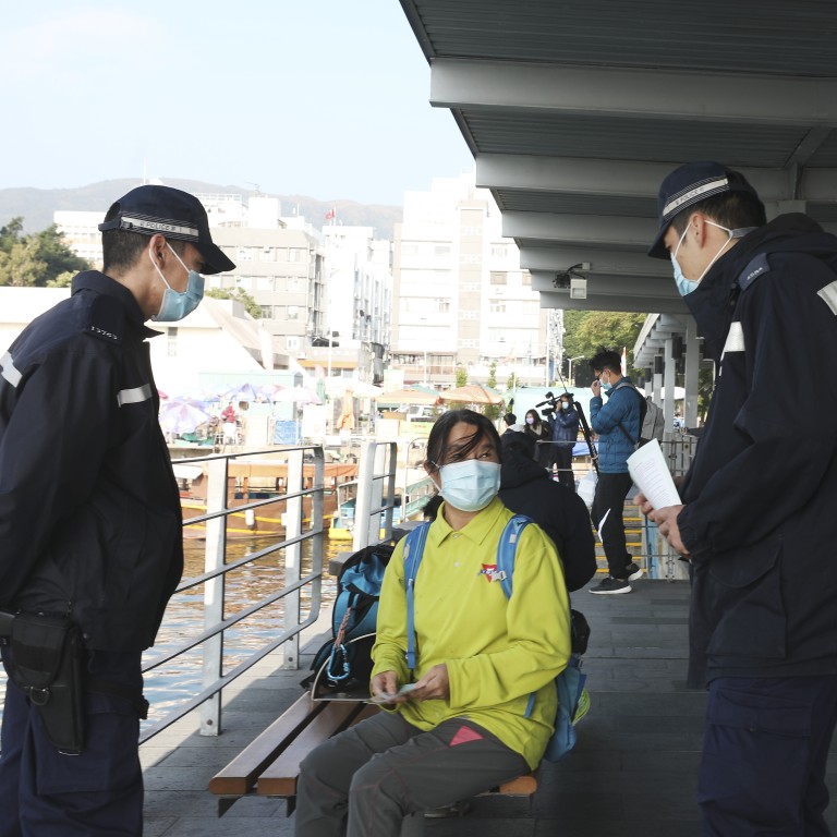 Hong Kong police coronavirus hotline buzzing with calls about suspected