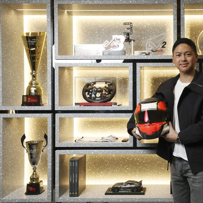 Racing driver Jonathan Hui in his simulator room surrounded by memorabilia from his career. Photo: Chen Xiaomei