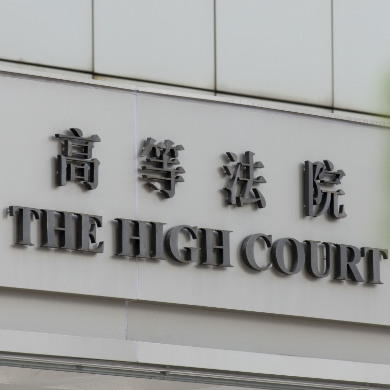Partner in Hong Kong law firm issues legal challenge against regulator
