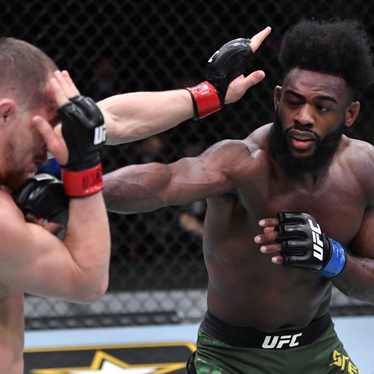 UFC 259 Aljamain Sterling wins bantamweight title, throws it away as