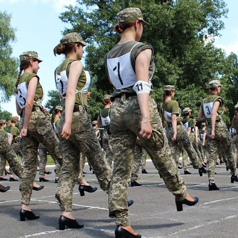 Ukraine s female soldiers wear heels while rehearsing for military
