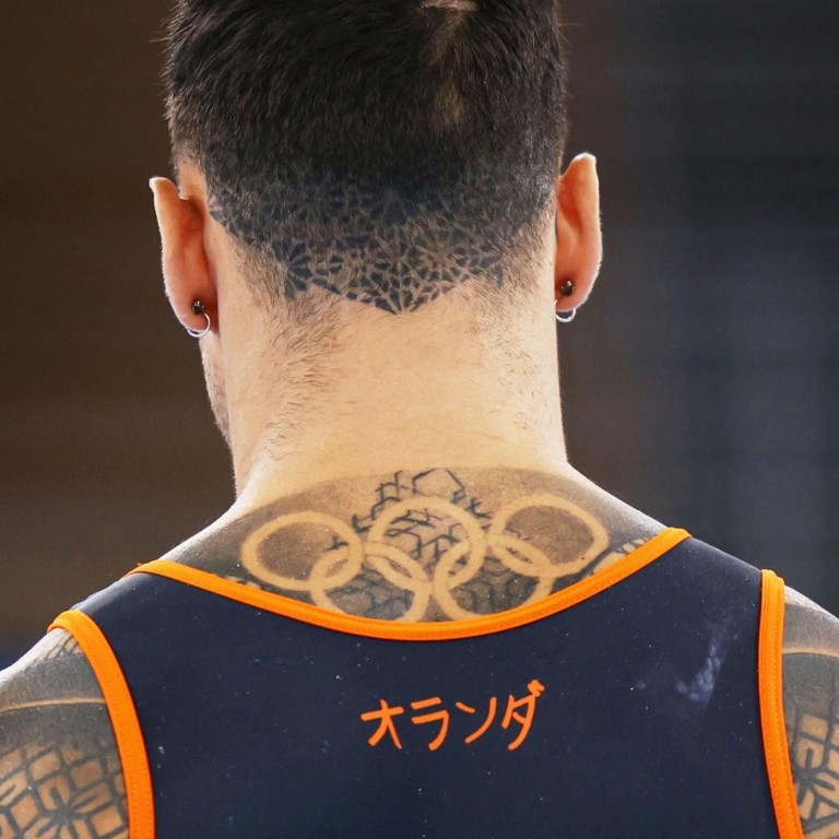 Photos from Olympic Tattoos - E! Online | Olympic tattoo, Olympics, Olympic  rings