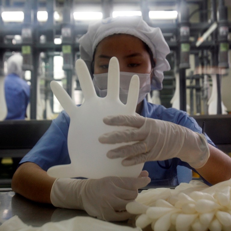 Malaysia’s Top Glove says US has lifted import ban prompted by forced