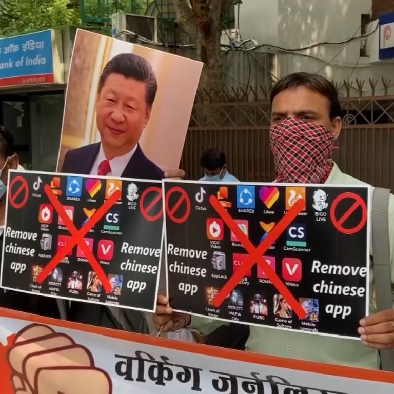 India bans dozens of Chinese apps, including TikTok and WeChat, after deadly border clash