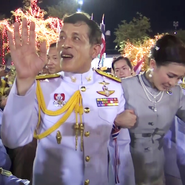 Thai king and queen meet thousands of supporters as pressure from anti-government protests mounts