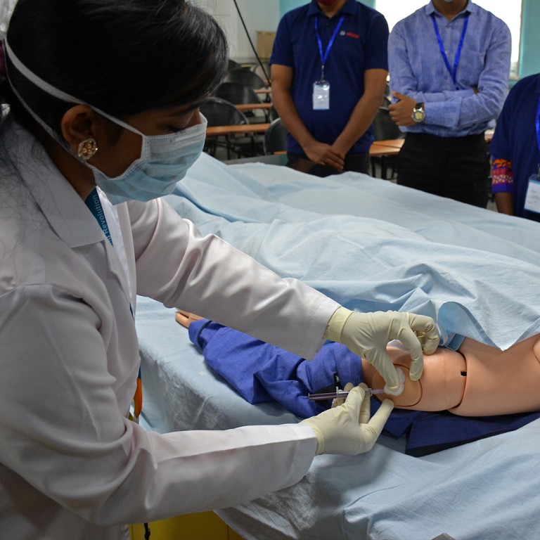 India trains workers to handle Covid-19 mass vaccination programme