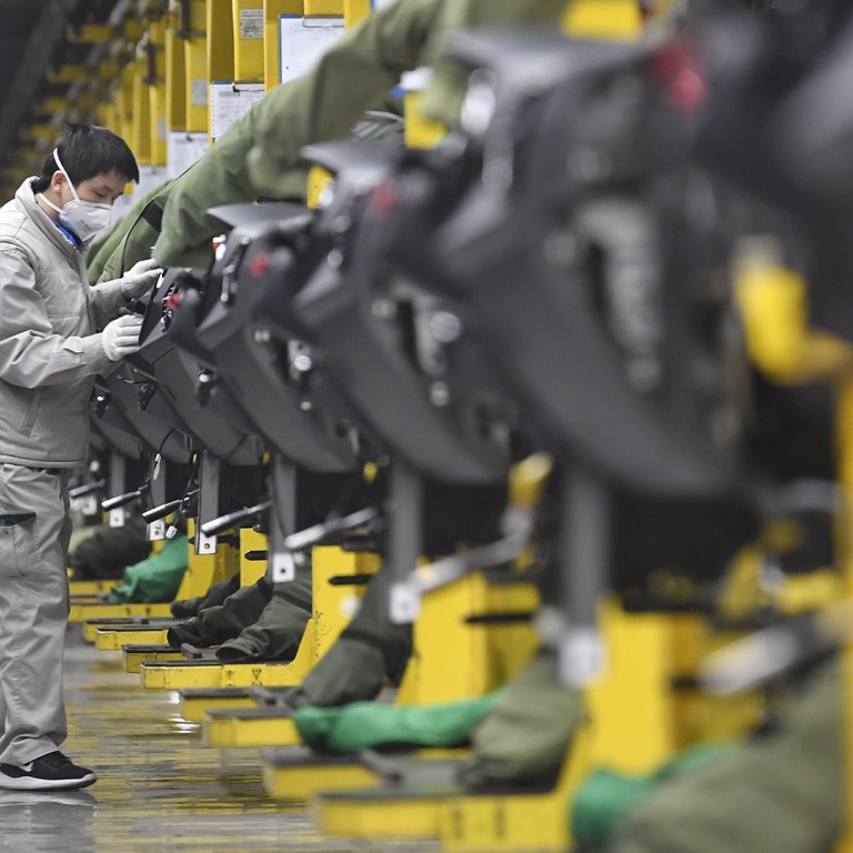 China’s economy accelerated at end of 2020, but virus-hit annual growth lowest in 45 years