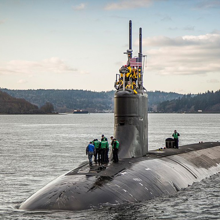 US submarine strikes unknown underwater object in disputed South China Sea