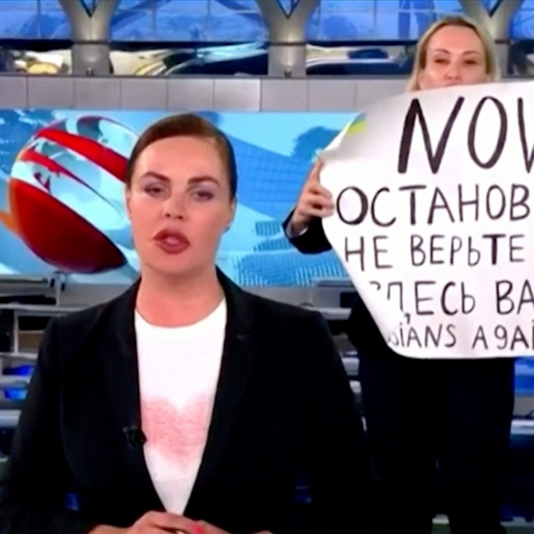 Russian journalist protests against Ukraine war on live TV - and is detained