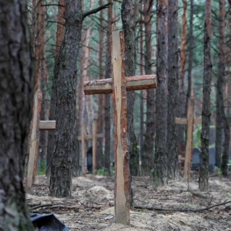 Ukraine says mass graves found in Izium after city recaptured from Russia
