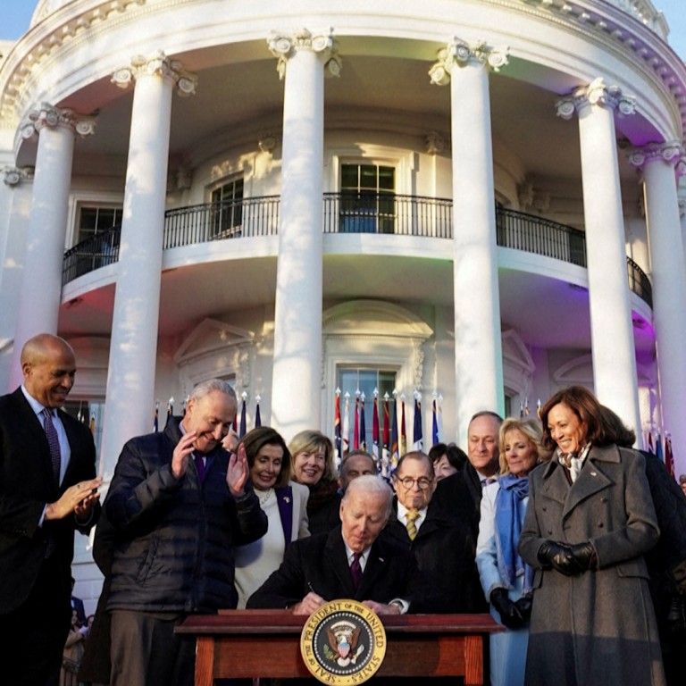 'Love is love': Biden signs new law protecting same-sex and interracial marriages