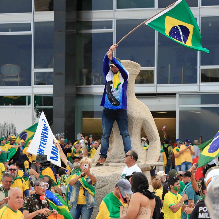 Bolsonaro supporters storm Brazil’s Congress and presidential palace